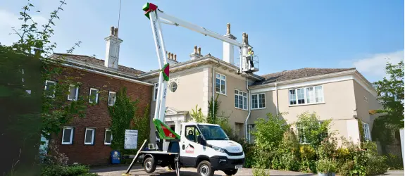 using our cherry picker on a commercial gutter cleaning job in Cornwall
